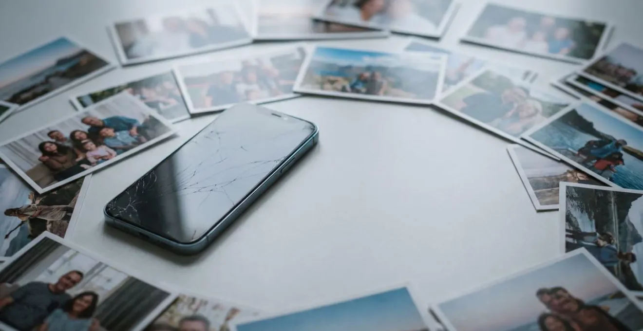 Broken smartphone with scattered digital memories illustrating data loss consequences